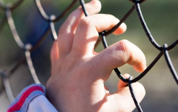 Opsluiting kinderen - Vluchtelingenwerk Vlaanderen